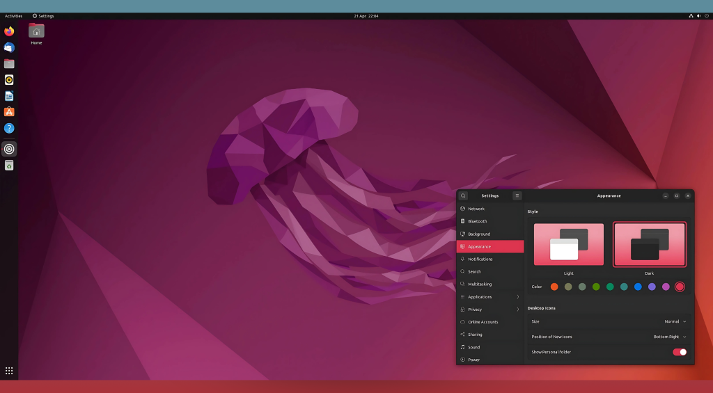 A sleek Ubuntu desktop with vibrant orange and purple gradients.